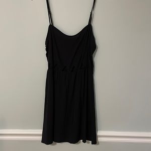 Mini black dress with triangle cutouts. Size 4 (small)